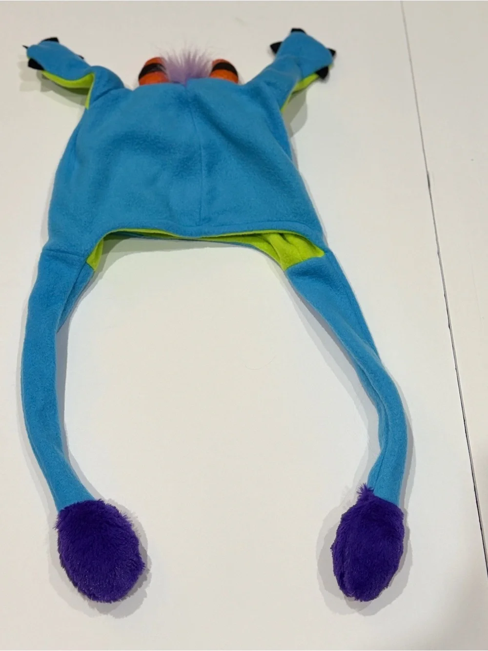 Blue & Lime Monster Earflap Hat with Purple Pom Poms